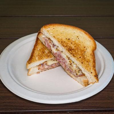 Ham and Swiss Sub · Served with mayo and stoneground mustard on sliced white.