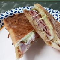 Special cubano · New special sub, roasted pulled pork, mustard aioli, ham, pickles, swiss cheese on ciabatta ...