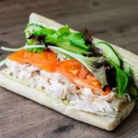 Turkey Avocado Ranch Sub Combo · Roasted turkey with avocado ranch, tomatoes, cucumber and organic greens on a French baguett...