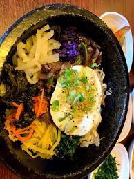 Dolsot Bibmbop · Choice of kimchee, beef, chicken, seafood, tofu, or tofu bibimbop.  Served in a hot sizzling...