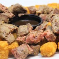 Bullseye Steak Bites · Grilled to order with side salad and tater tots.