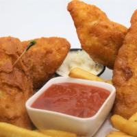 Fish and Chips · Fried rockfish with fries and tartar sauce.