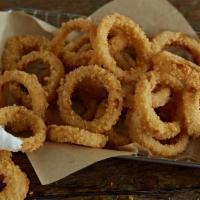 Onion Rings · Sweet, farm-fresh onions in crunchy sourdough breadcrumbs.
