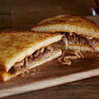 Sourdough Melt · Farm-fresh, never frozen U.S. beef grilled with caramelized onions, American and Wisconsin c...