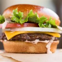 Rocket Burger · Our signature hamburger includes Wisconsin cheddar cheese, crisp leaf lettuce, fresh tomato,...