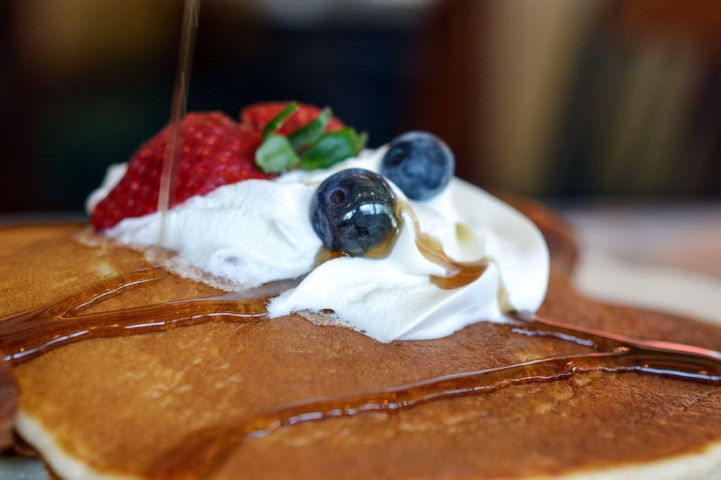 Golden Brown Pancakes · Served with butter and syrup. Available all day. 