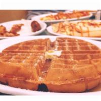 Golden Belgian Waffle · Served with butter and syrup. Available all day. 