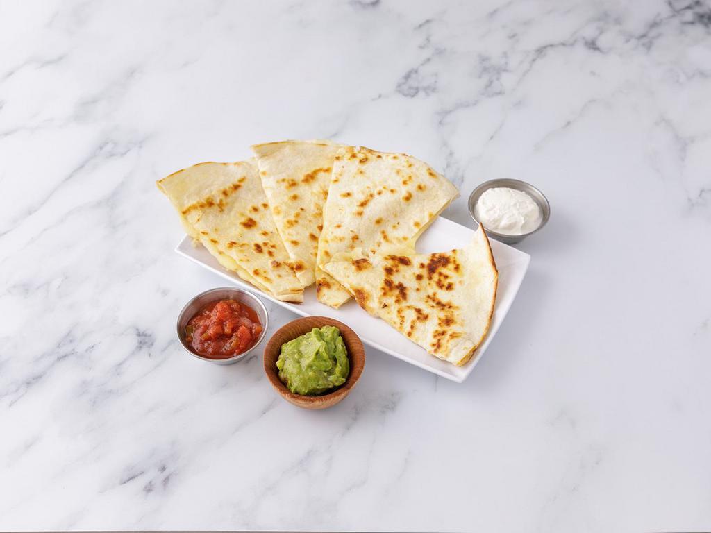 Quesadilla · Grilled flour tortilla with Monterey Jack cheese and salsa garnished with guacamole and sour cream.