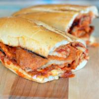 Chicken Cutlet Parmigiana Sandwich · Served with coleslaw and pickle. 