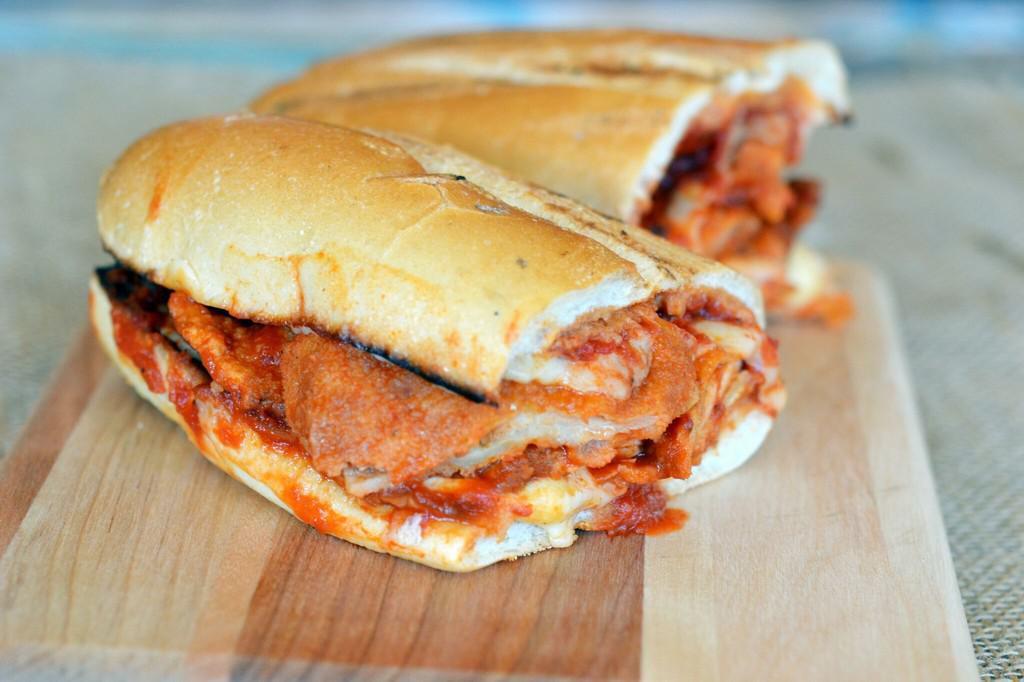 Chicken Cutlet Parmigiana Sandwich · Served with coleslaw and pickle. 