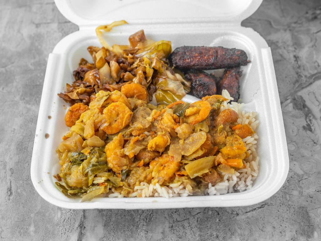 Curry Shrimp Meal · Served with rice and beans, peas, cabbage, and plantains.