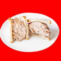 Turkey Pastrami Sandwich · Fresh roasted turkey cured and coated with pastrami spices.
