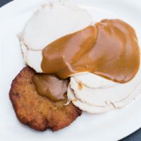 Turkey Favorite Open Sandwich · Fresh roasted sliced turkey on a potato pancake with gravy and applesauce.