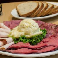 A La Sarge Cut Platter · Choice of any four meats and cheeses. Served with coleslaw, potato salad and your choice of ...