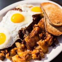 Corned Beef Hash and Eggs · Finest corned beef blended, grilled and served with three farm fresh eggs.