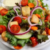 Garden Salad · Crispy iceberg lettuce, tomatoes, red onions, cucumber, carrots, and black olives. Choice of...