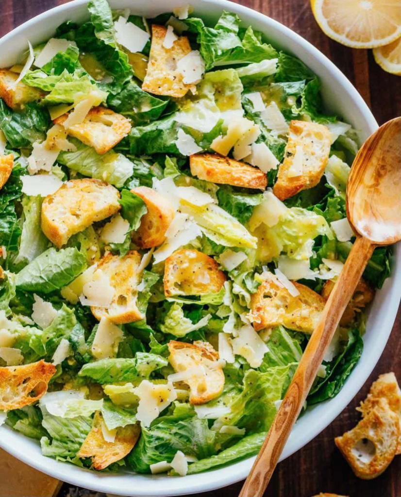 Caesar Salad · Crispy romaine lettuce, croutons, and imported Parmesan cheese with Caesar dressing. Add grilled chicken or chicken cutlet for an additional charge.