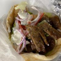 Gyros Specialty Sandwich · Gyro sandwich served on a warm pita bread, includes : lettuce, tomatoes, onions and tzatziki...