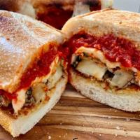 Eggplant Parmigiana Specialty Sandwich · Breaded fried eggplant, thinly sliced with house made marinara sauce and melted mozzarella c...