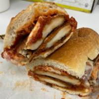 Chicken Parmigiana Specialty Sandwich · Freshly breaded Chicken Cutlet hot with melted mozzarella & Qboro’s house marinara sauce, on...