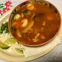 Caldo de Camarones · Spicy shrimp soup and tortilla.