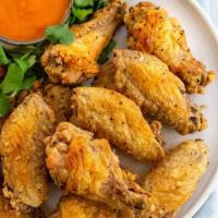 Chicken Wings · Cooked wing of a chicken coated in sauce or seasoning.