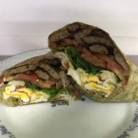 2. Fiesta Breakfast Wrap · Two over easy eggs, sausage, melted mozzarella cheese, spinach, caramelized onions and tomato.