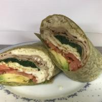 3. Spinach Healthy Breakfast Wrap · Two egg whites, turkey, spinach, avocado, melted Swiss cheese and tomato.