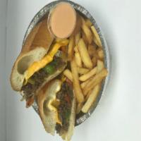 5. Philly Cheese Steak Sandwich · Seasoned steak sauteed with onions and American cheese.
Served with french fries.