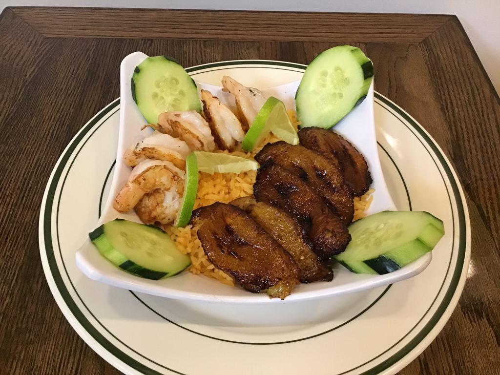 Camaron con Maduro y Arroz · Grilled shrimp served with yellow plantain, rice and vegetables
