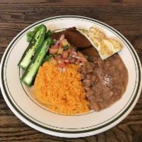 Milanesa de Pollo Rice, Beans, Pico de Gallo, Guacamole, Jalapeno, Chesse · Your choice of meat chicken, fried pork, chorizo, enchilada, al pastor.