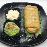 SHRIMP CHIMICHANGA · flour tortilla deep fried stuffed with rice, beans, cheese topped with sour cream, cotija ch...