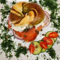 Garlic Lox Special · Hand rolled Bagel with Fresh Pastrami sliced Lox, Cream Cheese, Tomato, Capers & Onion 