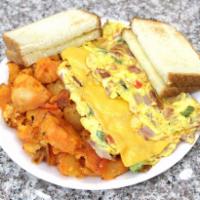M3. Western Omelette · Onions, peppers, and turkey or ham. Served with home fries, hash brown and toast.