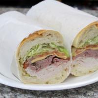 American special · Boars head roasted beef, oven gold turkey and American cheese with lettuce, tomato and choic...