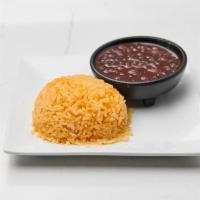Yellow Rice w/ Beans · sofrito flavored rice with black cuban beans
