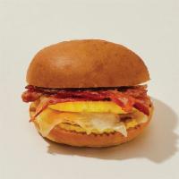 Egg & Bacon Brioche · Cage-free egg souffle and cheddar freshly baked in our ovens and served on a light and butte...