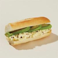 Egg Salad & Avocado Breakfast Baguette · Cage-free eggs, cage-free mayo, avocado and a sprinkle of chili salt on a toasted baguette.