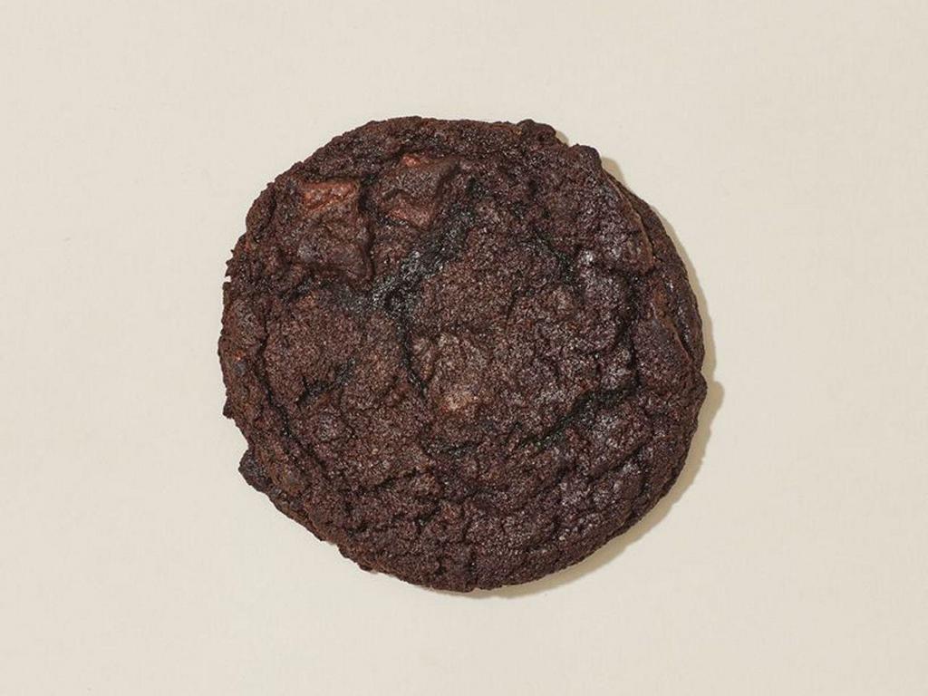 Chocolate Brownie Cookie · A decadent double-chocolate cookie with chocolate chunks. Perfect for when you can't decide between a fudge brownie or a chocolate chip cookie. Freshly baked throughout the day.