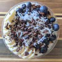 15 - Coconut Bowl · Coconut Base topped with Granola, Banana, Blueberry, Coconut Flakes, Raw Cacao Nibs