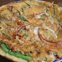 Hemul Pa-Jeon · A Korean style pancake made with seafood and vegetables.