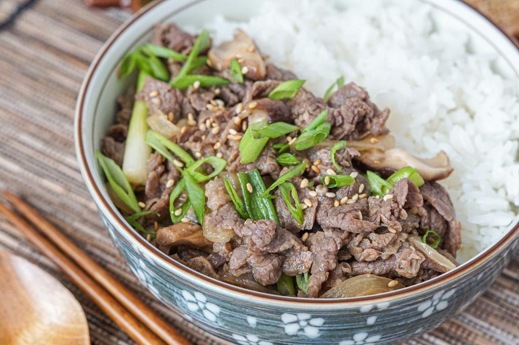 Bulgogi Deopbap · a rice bowl topped with marinated, thinly sliced beef.