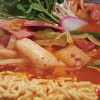 Boodae Jjigae · (Korean Army Stew) Spicy Ham and Assorted Sausage Stew with Ramen (ramen noodles are not coo...