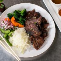 Galbi (Beef short rib) · Grilled premium beef short rib. Served with rice and vegetables.