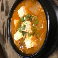 Kimchi Stew · This is one of traditional and common stew of Korean food. Kimchi stew includes pork and dic...
