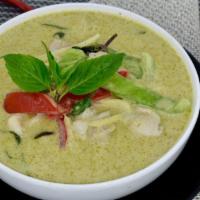 Green Curry · Bamboo shoots, bell peppers, Thai basil leaves, and choice of meat in rich green leafy curry...