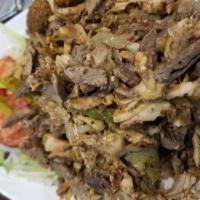 Mixed Shawarma Platter · Beef & Chicken Shawarma served over Rice And House Salad