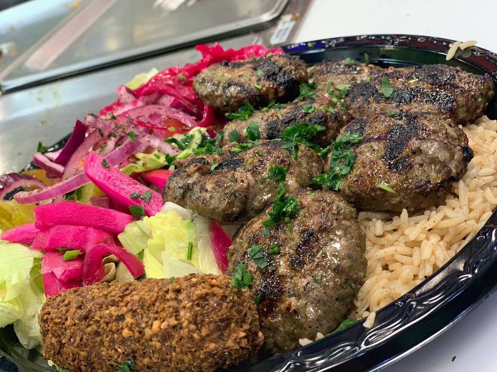 Kefta Platter  · A mix of ground beef and lamb with parsley, onion, garlic and mixed spices. Served over Rice and Salad