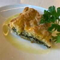 Spanakopita (Spinach Pie) · light and flaky homemade dough filled with a family recipe blend of feta cheese leeks spinac...