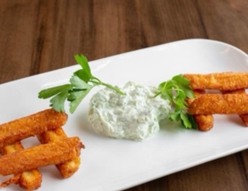 Halloumi Fries · Breaded and fried sticks of halloumi cheese.
